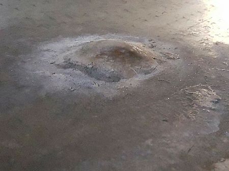 Fail:Calthemite_Stalagmite_on_concrete_floor.jpg