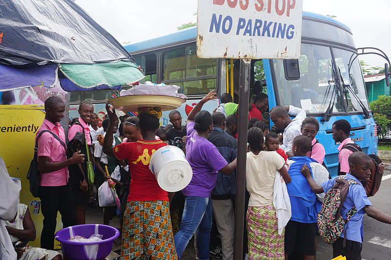 File:Commuters rush to board a National Transit Authority bus in Monrovia.jpg