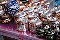 Small crafted copper containers on display in Santa Clara del Cobre, Michoacán