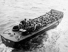 LCVPs, known as 'Higgins Boats', were the first specialized landing craft for the US Navy. Pictured, USS Darke LCVP 18, possibly with Army troops as reinforcements at Okinawa, 1945. Darke APA-159 - LCVP 18.jpg