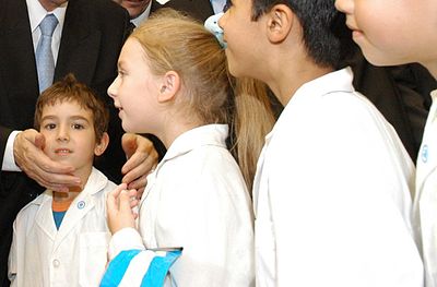 The ubiquitous white uniform of Argentine school children is a national symbol of learning.