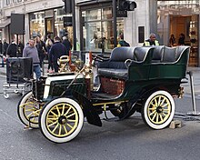 Dennis rear entrance tonneau. This 1902 car belongs to John C. R. Dennis, grandson of founder John C. Dennis Dennis 1902 Rear Entrance Tonneau at Regent Street Motor Show 2015.jpg