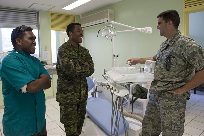 File:Dr. Leslie Bunabo, left, a dentist, speaks with Canadian Army Capt. Withny Dagrain, center, and U.S. Air Force Capt. Kevin Kunz about dental equipment and training during Pacific Partnership 2013 in Gizo 130802-N-SP369-236.jpg