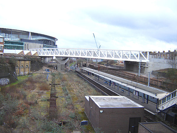 The remnants of the station's stabling yard are visible to the left of the platform, though the area has already been encroached upon by the bridge su
