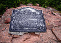 Plaque marking the summit of Eagle Mountain, the highest point in the state of Minnesota
