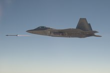 An F-22A of the 411th Flight Test Squadron test-fires an AIM-9X in 2015.