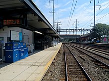 The Fairfield Metro-North station platform, tracks, and overpass Fairfield station from southbound train (2), July 2019.JPG