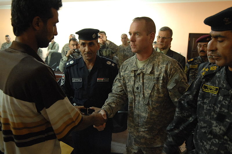 File:Family members of fallen Iraqi security forces members paid at Iraqi court house DVIDS242670.jpg