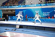 Deutsch: Fechten bei den Olympischen Jugend-Sommerspielen 2018: Tag 1, 7. Oktober 2018, Jungen, Säbel, Finale - Krisztián Rabb (HUN) - Hyun Jun (KOR) (USA) 15:13 English: Fencing at the 2018 Summer Youth Olympics at 7 October 2018 – Boys' sabre Gold medal match – Krisztián Rabb (HUN) Vs Hyun Jun (KOR) (USA) 15:13