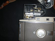 Energy storage capacitor for camera flash in a vintage Polaroid Flash.JPG