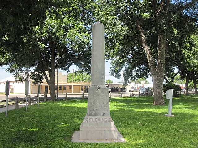 Obelisk monument to Burt M. Fleming (1894-1918), cited for bravery in World War I, is located on the lawn of the Kimble County courthouse.