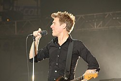 Bryan Adams set a record in 1991 for the longest run at the top of the UK charts. Flickr Bryan Adams in Peterborough 2009 (05).jpg