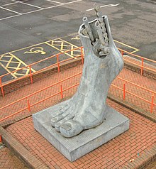 Footplate sculpture at Flint railway station, designed by Brian Fell. Footplate sculpture at Flint Station. - geograph.org.uk - 384656.jpg