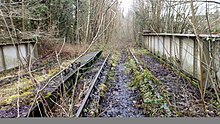 Old bridge with tracks in situ but out of use Former Keele railway on the Stoke-Market Drayton Line, tracks in situ but out of use..jpg