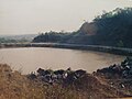 Foto de 1999, que muestra la laguna del cerro. Al fondo, el centro de la ciudad de Ñemby. Foto de Freddy Ovelar.jpg