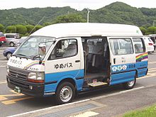 A Toyota HiAce minibus/schoolvan with a sliding door GE-RZH125B-Kanachu-a13-Yumebus.jpg