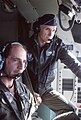 General Merrill McPeak observes operations in the cockpit of C-130 Hercules.jpg