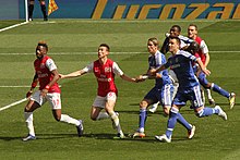 Song in action in 2012 Goal mouth melee 4 (6954477162).jpg