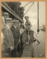 Harry Houdini stepping into a crate that will be lowered into New York Harbor as part of an escape stunt on July 7, 1912) - Dietz N.Y LCCN2010646057.tif