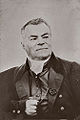 De architect Konstantin Ton droeg in 1870 een rozet van het lint van zijn orde op de revers.