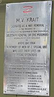 The plaque affixed to the wheelhouse in 1964 dedicating Krait as a war memorial
