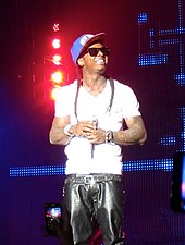 Rapper Lil Wayne collaborated with Madonna on the song "Revolver" from Celebration. Lil Wayne in Concert.jpg