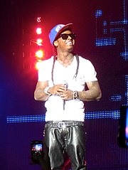 Lil Wayne, the founder of Young Money Entertainment, signed Drake to the label in 2009. Lil Wayne in Concert.jpg