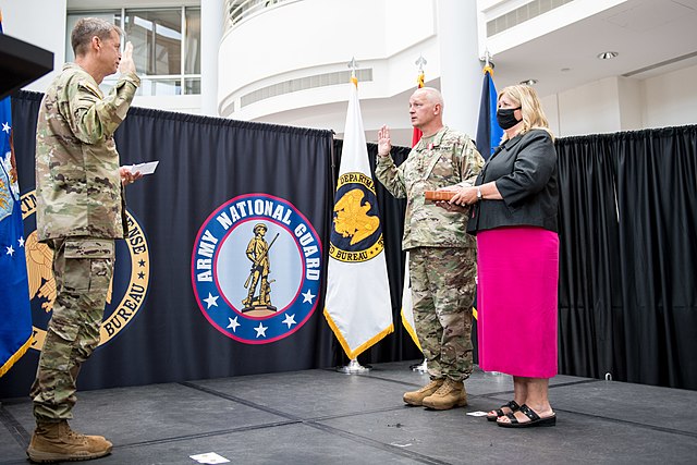 Chief of the National Guard Bureau Gen. Daniel R. Hokanson administers the oath of office to Lt. Gen. Jon A. Jensen as the 22nd director of the Army N