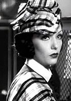 Lupe Velez in co-ordinated outfit and tam for the 1934 film Laughing Boy Lupe Velez in Laughing Boy trailer.jpg