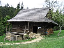 A log cottage from an open-air museum in the Kysuce region of Slovakia. This foothills region is bordered by two Carpathian sub-ranges, the Maple Mountains to the west and the Moravian-Silesian Beskids to the north. Cold snowy winters and a relative abundance of timber combine to inform the use of log wall construction and wooden shakes. Muzeum kysuckej dediny-1.jpg