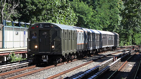 R16 car 6387 bypassing Avenue H station on the Train of Many Metals