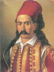 Portrait en couleurs d'un homme moustachu avec un fez rouge
