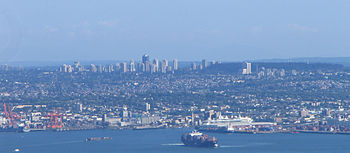 Metrotown (L) and Central Park (R) from Vancouver's North Shore. Port of Vancouver in foreground. Metrotown Central Park.JPG