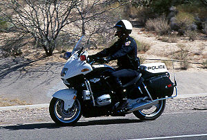 A motor officer patrolling in Arizona on a BMW...