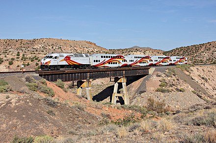 A Rail Runner train climbing the hill to Santa Fe.