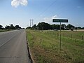 Community sign is on Hwy 71 looking north-northwest.