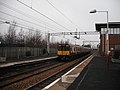 A Class 314 departs Newton towards the Cathcart Circle