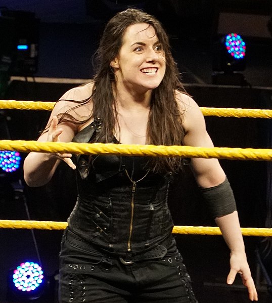 11-time and final champion Nikki Cross; during her first eight reigns, she was known as Nikki A.S.H.