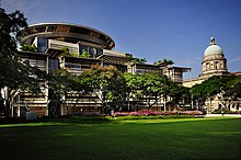 The Supreme Court Building, where the Constitution of the Republic of Singapore Tribunal sits, photographed on 24 May 2010. The dome of the Old Supreme Court Building is visible on the right. Old and New Supreme Courts.jpg