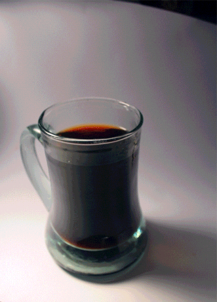 File:Pouring cream into drip coffee.gif