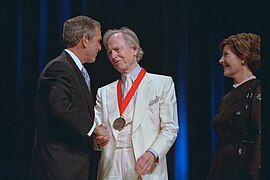 President George W. Bush and Laura Bush Attend the Arts and Humanities Awards Ceremony with Tom Wolfe.jpg