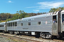 Seaboard Air Line Railroad (SAL) glass-roofed Sun Lounge Hollywood Beach, a 5-double-bedroom-buffet Pullman car introduced in 1956. Regular dome cars were too high for the tunnel clearances on the Northeast Corridor used by SAL trains north of Washington.