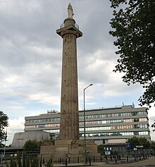 Shropshire's Shirehall is located opposite Lord Hill's Column. Shirehall and Lord Hill Column.JPG