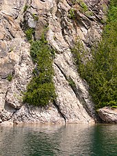 Approximately 9 m (30 ft) tall shatter cone located in McGreevy Harbour, Slate Islands