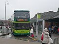Southern Vectis 1116 Bembridge Ledge (HW58 ATO), a Scania CN270UD 4x2 EB OmniCity in Stand F of Newport, Isle of Wight bus station on route 7. It was forced onto stand F to load passengers because its usual stand C was full with other buses, one of which was another on route 7. Servere delays on the route caused by heavy traffic caused the route to bunch, despite being 30 minutes apart.