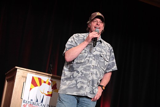 Ted Nugent, shown here addressing a Republican function in a military-style shirt, reportedly took extreme measures to avoid the draft.[161]