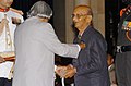 The President, Dr. A.P.J. Abdul Kalam presenting Padma Bhushan to Shri Arjun Singh for his contribution to wild life, at investiture ceremony in New Delhi on March 29, 2006.jpg