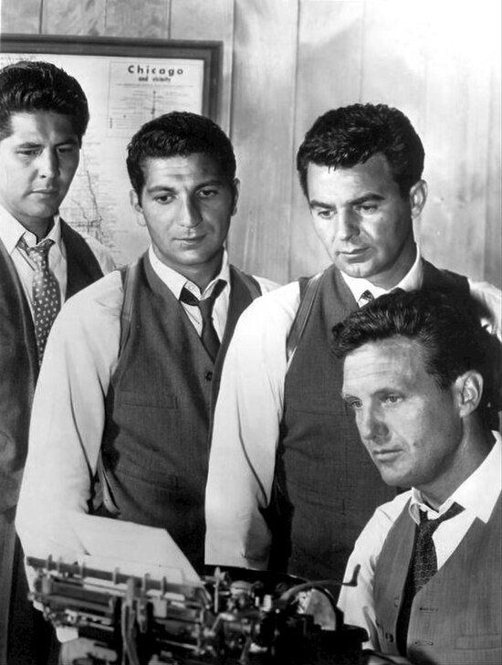 The cast from left: Abel Fernandez, Nicholas Georgiade, Paul Picerni, (seated) Robert Stack (not shown: Steve London)