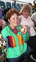 Tracy Lee Barrell holding Barcelona 1992 Paralympic medal Tracy Lee Barrell holding Barcelona 1992 Paralympic medal.jpg