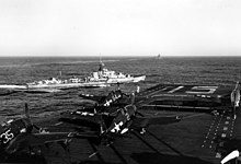 Urchin wearing the BPF pennant "D28", as seen from the aircraft carrier USS Randolph off Japan in August 1945. USS Randolph (CV-15) and HMS Urchin (D28) off Japan 1945.jpg